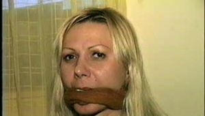 29 Yr OLD SEXY ROMANIAN IS FED A BANANA WHILE TIED TO A CHAIR, TAPE GAGGED & FREE HERSELF BY BITING HER RAWHIDE BONDS (D48-8)