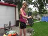 Watch Pia having fun outdoors with her shiny nylon Shorts