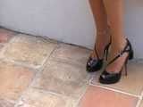 patent peep toe high heels dangling