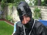 Watch Sandra enjoying Bondage  in her shiny nylon  Rainwear outside