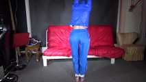 Sexy Sonja being tied and gagged overhead with ropes wearing a sexy blue shiny nylon pants and a jacket (Video)