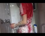 Sonja wearing a sexy red adidas shiny nylon jumpsuit while showering and messing up her clothes with shaving cream (Video)
