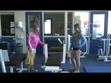 Katharina and Jenny in the fitness studio wearing sexy shiny nylon shorts and rain jackets (Video)