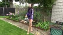 Watching Aiyana wearing a sexy purple shiny nylon shorts and a purple rain jacket while taking a shower in the garden (Video)