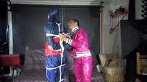 Ronja tied and gagged by stella in shiny nylon rainwear 