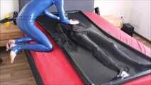 Play with slave girl in a vacuum bed