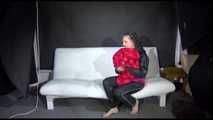 Watching Mara preparing her sofa with shiny nylon cloth wearing a sexy rainwear combination (Video)