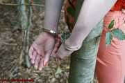 Handcuffed in the forest