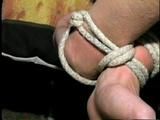 BALL-TIED, CROTCH-ROPED, WASHCLOTH ROPE GAGGED PIPER (D18-10)
