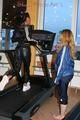 Stella and Leonie during their workout on the treadmill both wearing shiny nylon rainwear (Pics)