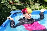 Mara wearing a supersexy 3/4 adidas pants and a supershiny pink/black rain jacket while sun bathing and go swimming in the pool (Pics)