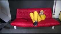 ***MARA*** ties and gagges with cuffs on the sofa wearing a supersexy oldschool yellow rain suit with hood (Video)