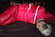 ***COURTNEY***NEW MODELL***being tied and gagged with ropes and a ballgag on a sofa wearing a pink rain pants and a pink doen jacket (Pics)