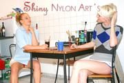 Jenny and Yvonne having a good time together wearing shiny nylon shorts and tops (Pics)