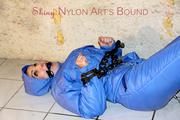 Jill tied, gagged anmd hooded with old handcuffs lying in an old cellar wearing a sexy lightblue skibib (Pics)