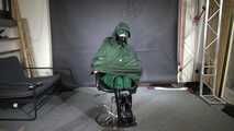 Marie M. taped and gagged in shiny nylon rainwear