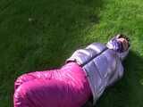 Watch Sandra being bound and gagged in her shiny nylon Downjacket