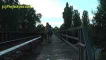 020157 Kathy Takes A Pee From The Railway Bridge