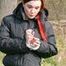 Jill tied, gagged and hooded on a tree outdoor wearing a shiny black down jacket (Pics)