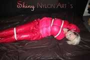 ***COURTNEY***NEW MODELL***being tied and gagged with ropes and a ballgag on a sofa wearing a pink rain pants and a pink doen jacket (Pics)