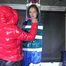 SEXY RONJA wearing shiny nylon downwear being tied and hooded with tapes from Stella on a rack (Video)