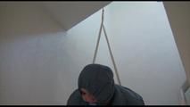 Jill tied, gagged and hooded in an stairway wearing a sexy shiny grey downwear (Video)