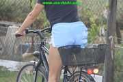 Watch Sandra riding her bike enjoying her shiny nylon shorts