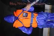 See Ronja tied and gagged by Stella in shiny nylon Rainwear and a Life Vest!