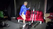 Watching sexy Sandra wearing a sexy blue/yellow shiny nylon shorts and a blue rain jacket during her workout (Video)
