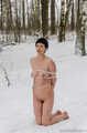 Naked barefoot Claudia tied up in cold winter snow
