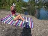 Watch Chloe enjoying her Shiny nylon Shorts in Nature