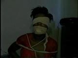 ACE BANDAGE GAGGED, CHAIR TIED CAPTIVE (D9-18)