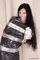 Marvita - Self mummified in trash bag