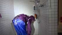 Sexy Sandra during her shaving cream action in the shower wearing a sexy blue shiny nylon rain pants and a shiny nylon purple rain jacket (Video)