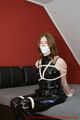 Miss J get hogtied gagged in a shiny PVC outfit