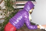 Alina tied and gagged on a commode wearing a shiny red/purple downwear combination (Pics)