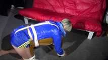 Watching sexy Sonja wearing a sexy shiny nylon shorts in blue and a blue rain jacket being tied and gagged on a stool with ropes and a clothgag (Video)