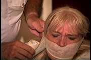 50 Yr OLD REAL ESTATE AGENT GETS MOUTH STUFFED, VET TAPE WRAP GAGGED, BAREFOOT, BALL-TIED, TOE-TIED, HANDGAGGED, GAG TALKING AND NECK AND BODY TICKLED (D74-13)