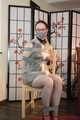 Lady Nadja is bound and gagged in a nice PVC dress and a transparent raincoat trying to escape