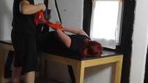 Aurora hogtied on table 1/2