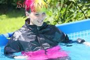 Mara wearing a supersexy 3/4 adidas pants and a supershiny pink/black rain jacket while sun bathing and go swimming in the pool (Pics)