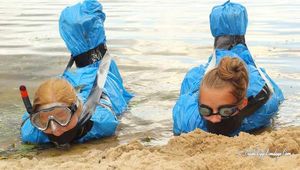 Dana and Asya - both ends up packed in trash bags in the water