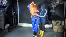 RONJA being tied, gagged and hooded hanging with ropes and a ballgag from Stella both wearing sexy shiny nylon rainwear and Ronja a lifevest (Video)