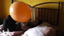 giant balloon in the bed