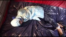 Lulu tied and gagged on a bed wearing a sexy blue shiny nylon rainpants and a iceblue PAMY downjacket (Video)