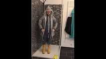 Lady Nadja in AGU rainwear and transparent raingear under the shower