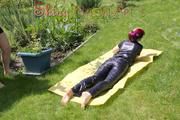 Mara sunbathing and swimming in the pool wearing a supersexy black adidas shiny nylon rainwear (Pics)