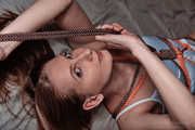 Sensitive touching in color rope bondage