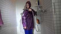 Sexy Sandra during her shaving cream action in the shower wearing a sexy blue shiny nylon rain pants and a shiny nylon purple rain jacket (Video)