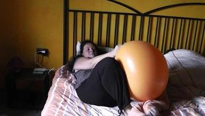 giant balloon in the bed